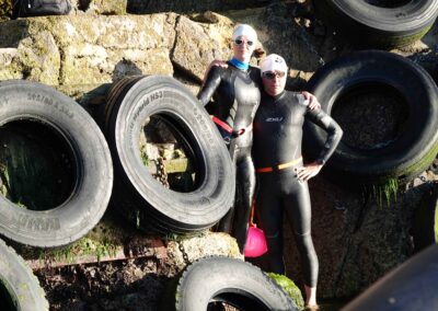 Amanda Love and Dave Astins just about to swim around Skomer in August 2022