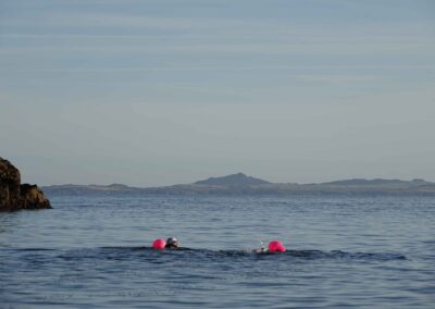 Amanda Love and Dave Astins swimming around Skomer in August 2022